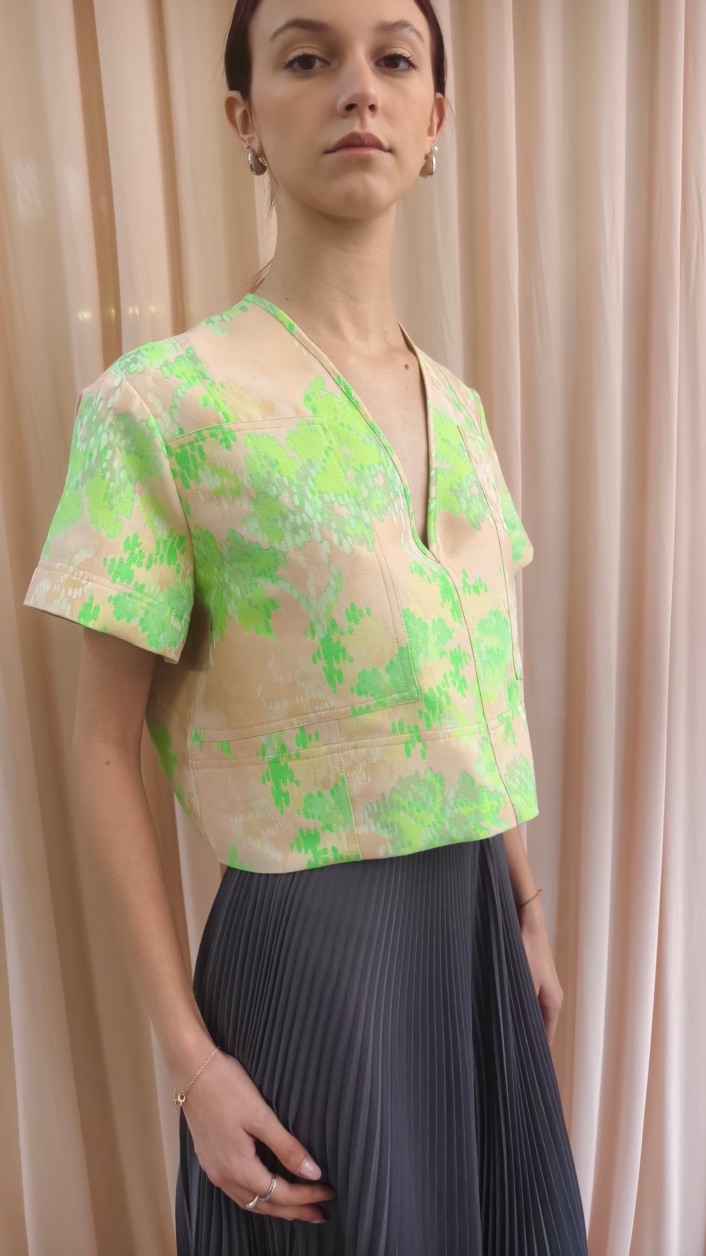Top scollo a V in cotone rigato