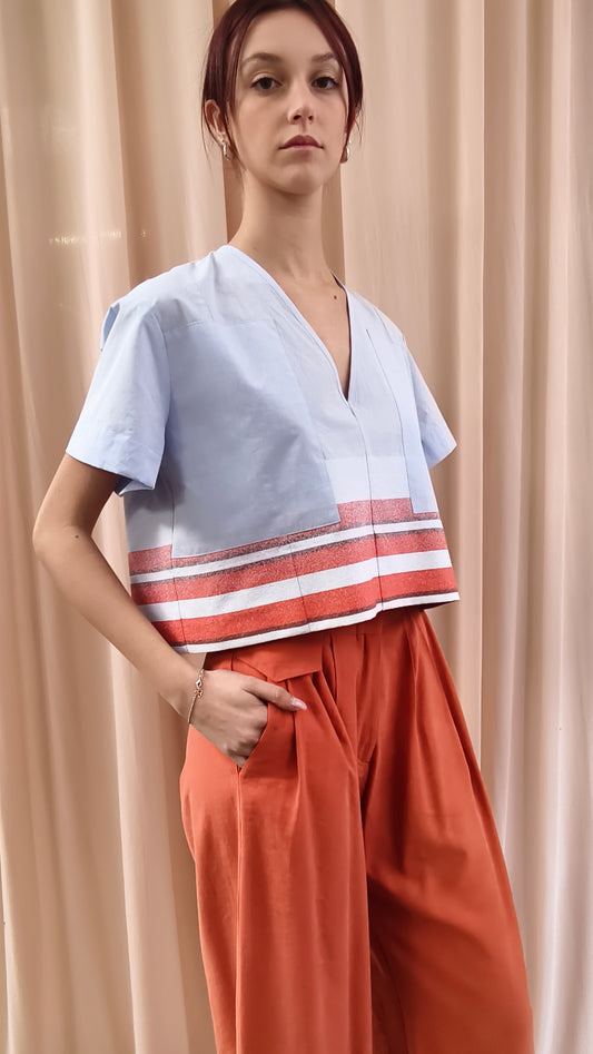 Top scollo a V in denim stretch