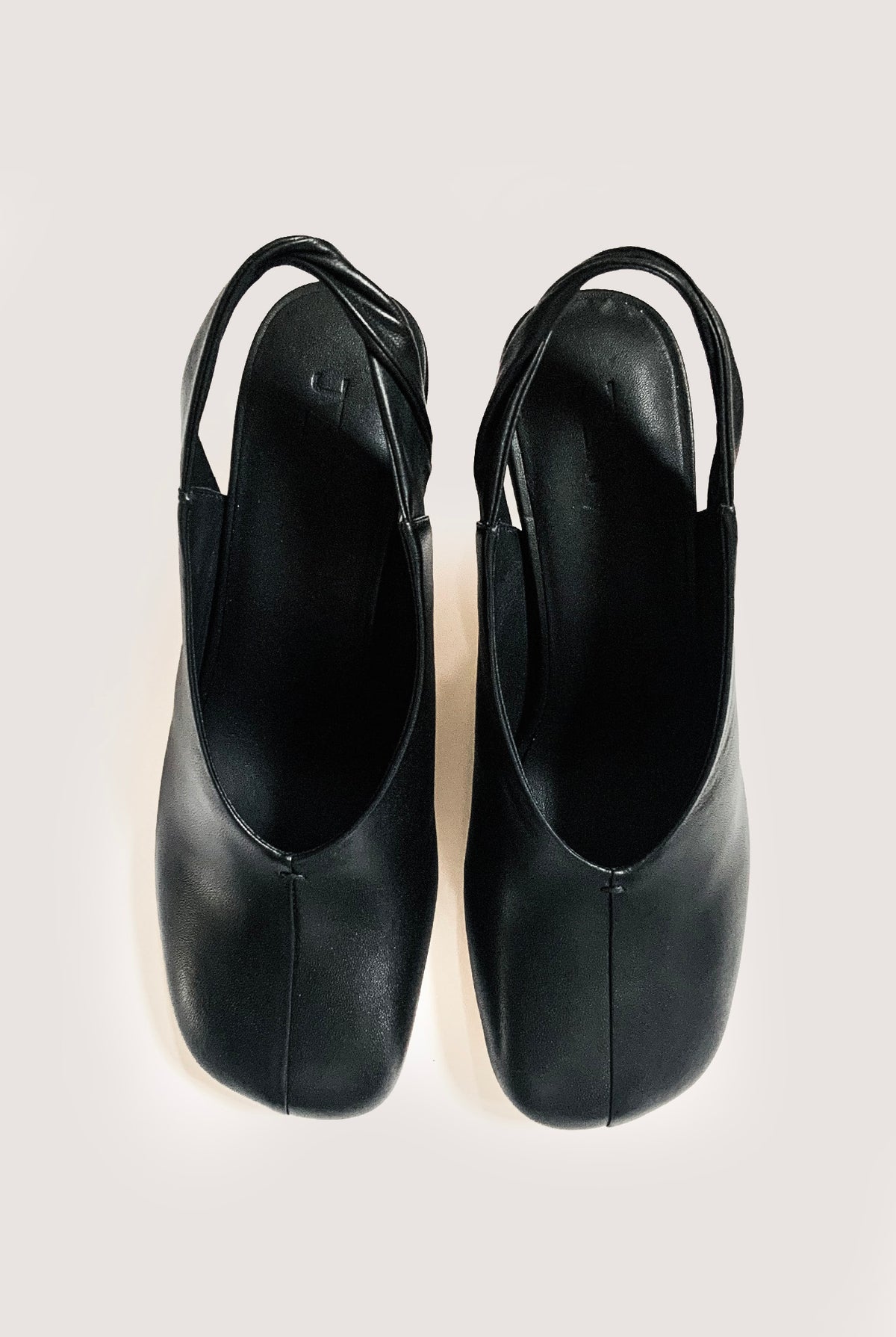 Dez- Twist Detailed Cylinder Heel Slinback